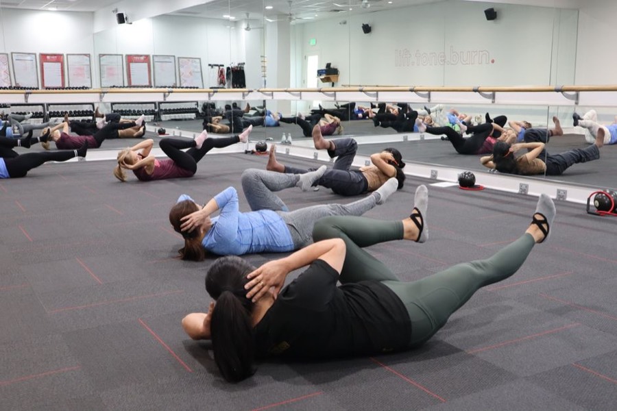 Group fitness class training indoors